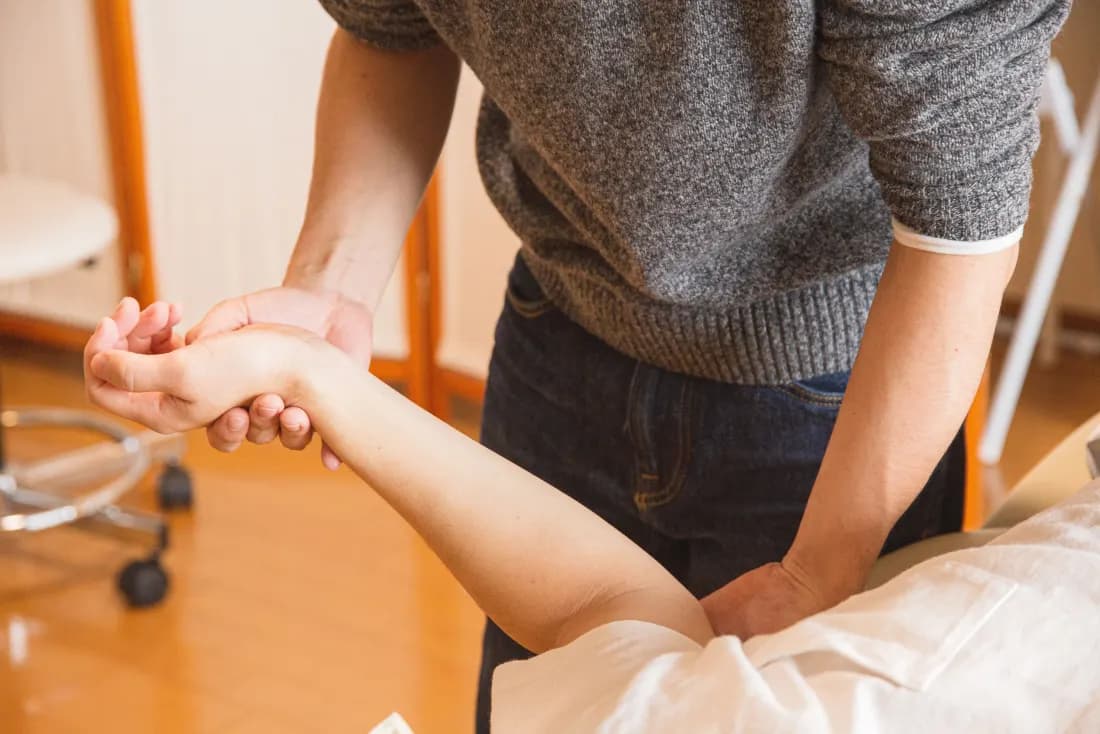 Careful mobilization of a client's wrist